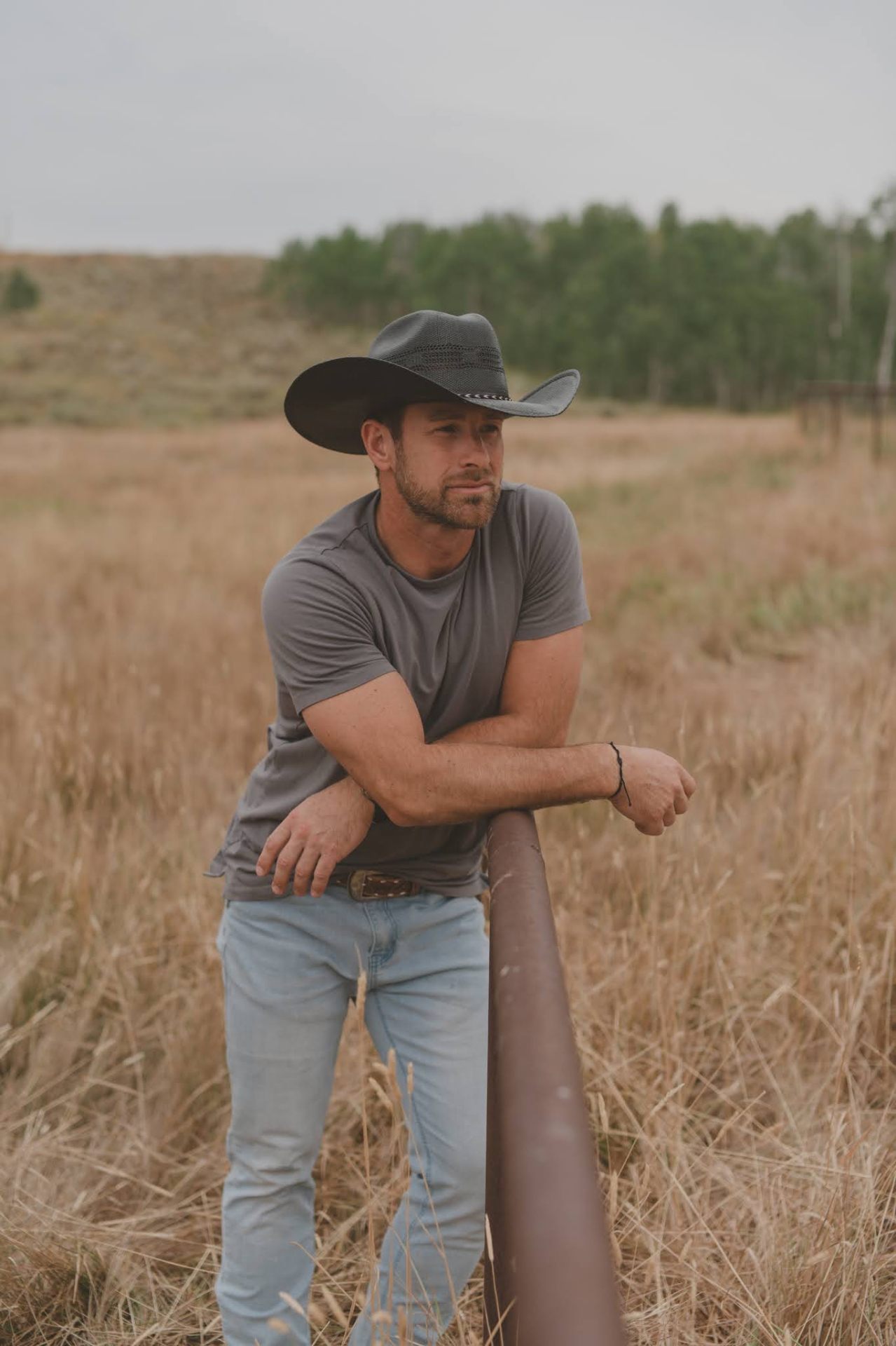 Bubba Page — reflective portrait on the ranch